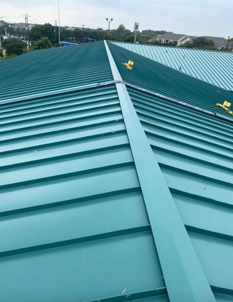 Green commercial metal roof ridge and valley for Metal Roof Repair in Terrace Heights